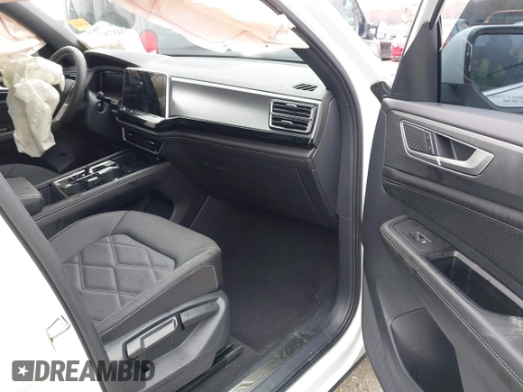 2024 Volkswagen Atlas SE with VIN 1V2KE2CA3RC235187, listed as a IAAI auction lot 42017847 with 12,575 mi miles and . Bid and sale history available at DreamBid. Image 5.