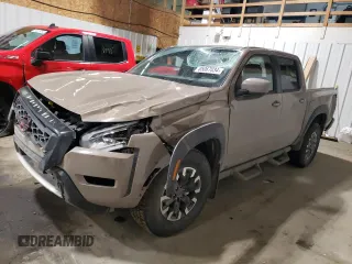 2024 Nissan Frontier Pro-4X with VIN 1N6ED1EK3RN674957, listed as a Copart auction lot 85067034 with 1,580 mi miles and Salvage title. Bid and sale history available at DreamBid. Image 1.