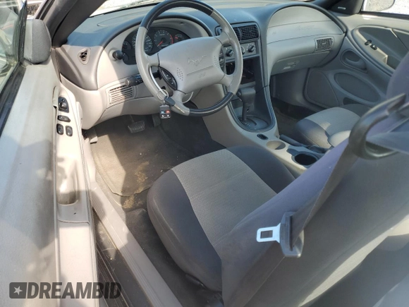 2004 Ford Mustang Standard with VIN 1FAFP40674F229138, listed as a Copart auction lot 56186445 with 128,566 mi miles and Salvage title. Bid and sale history available at DreamBid. Image 8.