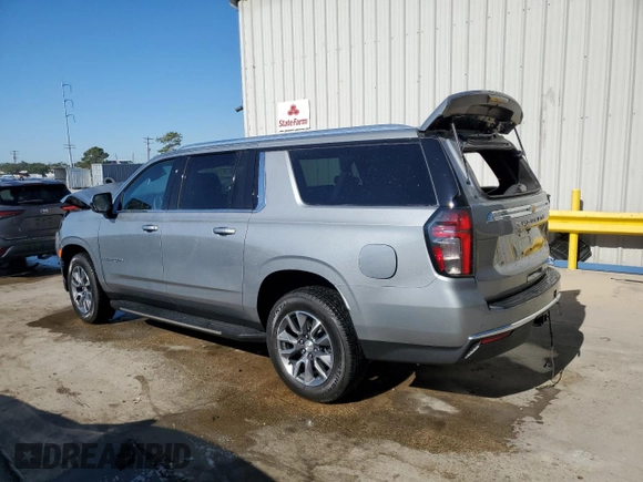 2024 Chevrolet Suburban LS with VIN 1GNSCBKD3RR252188, listed as a Copart auction lot 76882484 with 11,997 mi miles and Salvage Title. Bid and sale history available at DreamBid. Image 2.