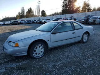 1995 Ford Thunderbird LX with VIN 1FALP62W5SH214974, listed as a Copart auction lot 42856995 with 150,454 mi miles and Clean Title. Bid and sale history available at DreamBid. Image 1.