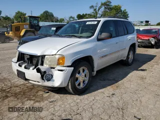 2005 GMC Envoy SLT with VIN 1GKDT13S852185958, listed as a Copart auction lot 68736194 with 225,398 mi miles and Salvage Title. Bid and sale history available at DreamBid. Image 1.