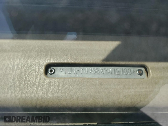 1999 Jeep Wrangler Sahara with VIN 1J4FY49S8XP472733, listed as a Copart auction lot 58174915 with 170,838 mi miles and Salvage title. Bid and sale history available at DreamBid. Image 14.