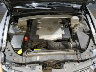 2008 Cadillac CTS AWD z VIN 1G6DG577480197914, wystawiony jako Copart lot #52956555 z przebiegiem 202 753 mil mil oraz Szkoda całkowita • Salvage title. Historia ofert i sprzedaży dostępna na DreamBid. Obrazek 11.