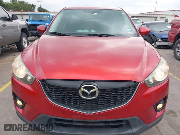 2015 Mazda CX-5 Touring with VIN JM3KE4CYXF0439953, listed as a IAAI auction lot 42124197 with 242,614 mi miles and . Bid and sale history available at DreamBid. Image 12.