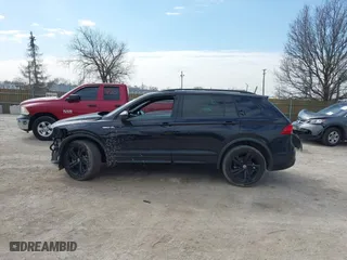 2023 Volkswagen Tiguan SE R-Line Black with VIN 3VV8B7AX4PM019421, listed as a IAAI auction lot 41885691 with 36,332 mi miles. Bid and sale history available at carsss.com. Image 15.