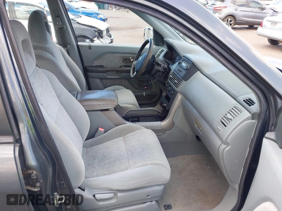 2004 Honda Pilot LX with VIN 2HKYF18114H591405, listed as a IAAI auction lot 42386073 with 71,295 mi miles and . Bid and sale history available at DreamBid. Image 5.