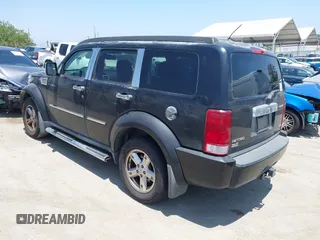 2007 Dodge Nitro SLT z VIN 1D8GT58K27W578490, wystawiony jako IAAI lot #42335125 z przebiegiem 125 826 mil mil oraz . Historia ofert i sprzedaży dostępna na DreamBid. Obrazek 3.