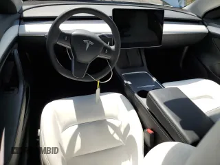 2023 Tesla Model 3 z VIN 5YJ3E1EA6PF517935, wystawiony jako Copart lot #60980325 z przebiegiem 45 496 mil mil oraz Szkoda całkowita • Salvage title. Historia ofert i sprzedaży dostępna na DreamBid. Obrazek 8.