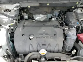 2021 Mitsubishi Outlander SE с VIN JA4APVAU6MU034208, выставлен на аукционе Copart как лот 68163615 с пробегом 87 956 миль миль и Списание • Salvage title. История ставок и продаж доступна на DreamBid. Изображение 14.