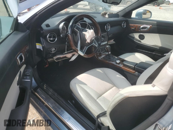 2013 Mercedes-Benz SLK 250 with VIN WDDPK4HA1DF057927, listed as a Copart auction lot 49314755 with 53,876 mi miles and Salvage title. Bid and sale history available at DreamBid. Image 8.
