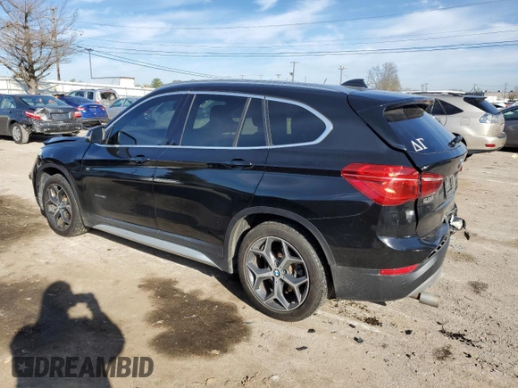 2016 BMW X1 xDrive28i z VIN WBXHT3C35G5E50005, wystawiony jako Copart lot #74476533 z przebiegiem 128 031 mil mil oraz Szkoda całkowita • Salvage title. Historia ofert i sprzedaży dostępna na DreamBid. Obrazek 2.
