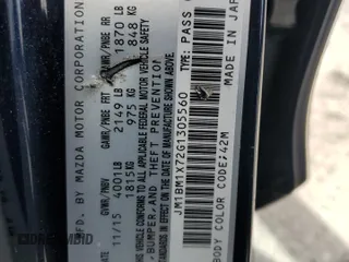 2016 Mazda Mazda3 i Grand Touring with VIN JM1BM1X72G1305560, listed as a Copart auction lot 52333205 with 158,906 mi miles and Salvage Title. Bid and sale history available at carsss.com. Image 14.