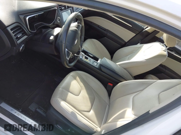 2017 Ford Fusion Hybrid Titanium с VIN 3FA6P0RU7HR148191, выставлен на аукционе IAAI как лот 42167708 с пробегом 72 708 миль миль и . История ставок и продаж доступна на DreamBid. Изображение 21.