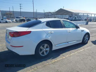 2015 Kia Optima LX with VIN 5XXGM4A70FG381555, listed as a IAAI auction lot 42632259 with 139,644 mi miles and . Bid and sale history available at DreamBid. Image 4.