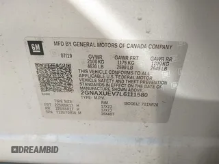 2020 Chevrolet Equinox LT with VIN 2GNAXUEV7L6111580, listed as a IAAI auction lot 41830060 with 96,968 mi miles and . Bid and sale history available at DreamBid. Image 9.