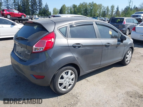 2015 Ford Fiesta SE with VIN 3FADP4EE1FM195949, listed as a IAAI auction lot 42122089 with Not Provided miles. Bid and sale history available at carsss.com. Image 4.