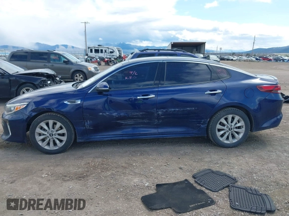 2018 Kia Optima LX z VIN 5XXGT4L32JG205418, wystawiony jako IAAI lot #42062997 z przebiegiem 103 126 mil mil oraz . Historia ofert i sprzedaży dostępna na DreamBid. Obrazek 14.