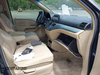 2005 Honda Odyssey EX-L with VIN 5FNRL38775B085512, listed as a IAAI auction lot 42128261 with Not Provided miles and . Bid and sale history available at DreamBid. Image 5.