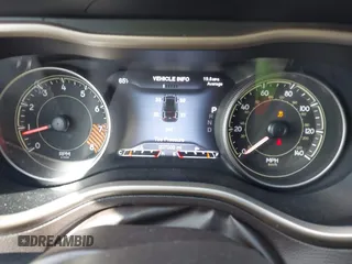 2014 Jeep Cherokee Trailhawk with VIN 1C4PJMBS3EW127749, listed as a IAAI auction lot 41836617 with 207,002 mi miles and . Bid and sale history available at DreamBid. Image 7.