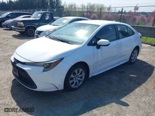 2021 Toyota Corolla LE with VIN 5YFEPMAE6MP196718, listed as a IAAI auction lot 41973585 with 56,826 mi miles. Bid and sale history available at carsss.com. Image 2.