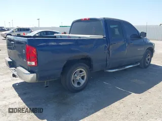 2004 Dodge 1500 SLT with VIN 1D7HA18N04J144868, listed as a IAAI auction lot 41870559 with 157,379 mi miles. Bid and sale history available at carsss.com. Image 4.