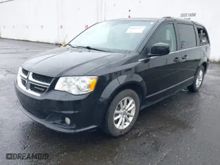 2019 Dodge Grand Caravan SXT with VIN 2C4RDGCG0KR595339, listed as a IAAI auction lot 41841547 with 96,888 mi miles. Bid and sale history available at carsss.com. Image 2.