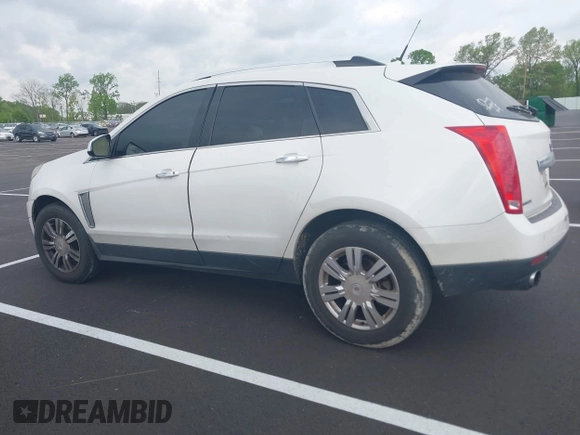2014 Cadillac SRX Luxury Collection with VIN 3GYFNBE36ES519705, listed as a IAAI auction lot 42069288 with 211,632 mi miles and . Bid and sale history available at carsss.com. Image 14.