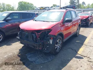 2016 Toyota RAV4 LE with VIN JTMZFREV1GJ098247, listed as a IAAI auction lot 42065800 with 199,172 mi miles and . Bid and sale history available at DreamBid. Image 19.