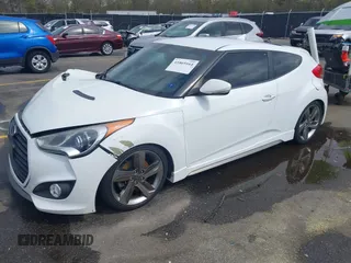 2013 Hyundai Veloster Turbo z VIN KMHTC6AE6DU112233, wystawiony jako IAAI lot #41869164 z przebiegiem 151 091 mil mil oraz . Historia ofert i sprzedaży dostępna na DreamBid. Obrazek 17.