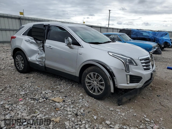 2017 Cadillac XT5 Luxury FWD with VIN 1GYKNBRS7HZ263985, listed as a Copart auction lot 50231215 with 28,542 mi miles and Salvage Title. Bid and sale history available at DreamBid. Image 4.