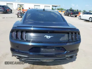 2021 Ford Mustang EcoBoost with VIN 1FA6P8TH7M5134461, listed as a IAAI auction lot 42526727 with 56,494 mi miles and . Bid and sale history available at DreamBid. Image 16.