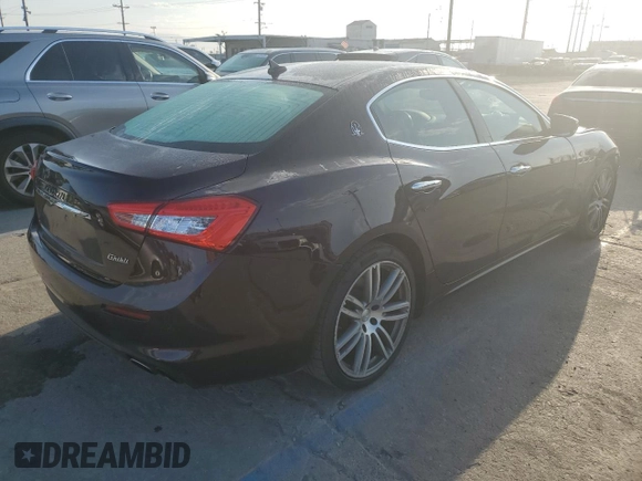 2018 Maserati Ghibli with VIN ZAM57XSA0J1286682, listed as a Copart auction lot 65457315 with 50,169 mi miles and Salvage title. Bid and sale history available at DreamBid. Image 3.