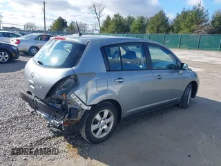 2009 Nissan Versa 1.8 SL with VIN 3N1BC13E69L390702, listed as a IAAI auction lot 41202841 with 33,709 mi miles. Bid and sale history available at carsss.com. Image 4.
