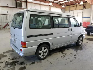 2003 Volkswagen EuroVan MV с VIN WV2NB47073H001005, выставлен на аукционе Copart как лот 87284844 с пробегом 283 979 миль миль и Чистый • Clean title. История ставок и продаж доступна на DreamBid. Изображение 3.