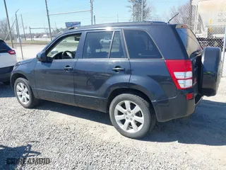 2012 Suzuki Grand Vitara Limited with VIN JS3TD0D79C4101075, listed as a IAAI auction lot 41779558 with 132,863 mi miles. Bid and sale history available at carsss.com. Image 3.
