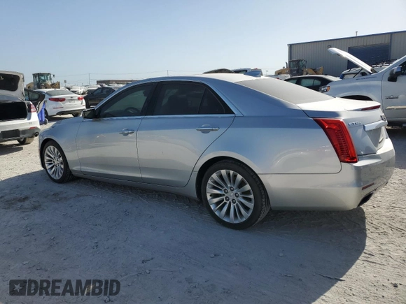 2016 Cadillac CTS Luxury Collection AWD with VIN 1G6AX5SX7G0103193, listed as a Copart auction lot 61808174 with 104,129 mi miles and Clean Title. Bid and sale history available at DreamBid. Image 2.