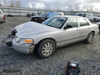 2006 Ford Crown Victoria LX with VIN 2FAFP74W76X153598, listed as a Copart auction lot 80923494 with 196,703 mi miles and Salvage Title. Bid and sale history available at carsss.com. Image 1.
