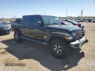 2020 Jeep Gladiator Overland with VIN 1C6HJTFG0LL106948, listed as a Copart auction lot 61496915 with 72,763 mi miles and Salvage title. Bid and sale history available at DreamBid. Image 4.