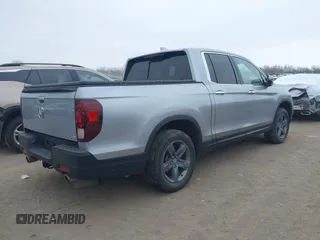 2021 Honda Ridgeline RTL-E with VIN 5FPYK3F79MB010091, listed as a IAAI auction lot 41386318 with 37,996 mi miles and . Bid and sale history available at DreamBid. Image 4.