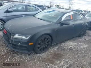 2013 Audi A7 3.0 Prestige with VIN WAU2GAFC4DN081943, listed as a IAAI auction lot 41599395 with 129,458 mi miles. Bid and sale history available at carsss.com. Image 2.