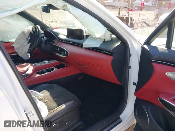 2022 Genesis GV70 Sport z VIN KMUMCDTC1NU035343, wystawiony jako IAAI lot #40788562 z przebiegiem Nie podano mil oraz . Historia ofert i sprzedaży dostępna na DreamBid. Obrazek 5.