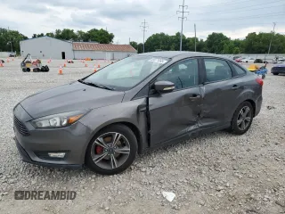 2016 Ford Focus SE with VIN 1FADP3FE6GL266932, listed as a Copart auction lot 60871095 with 95,097 mi miles and Salvage title. Bid and sale history available at DreamBid. Image 1.