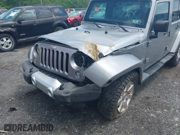 2014 Jeep Wrangler Unlimited Sahara z VIN 1C4BJWEG0EL129229, wystawiony jako IAAI lot #42380976 z przebiegiem 175 735 mil mil oraz . Historia ofert i sprzedaży dostępna na DreamBid. Obrazek 6.