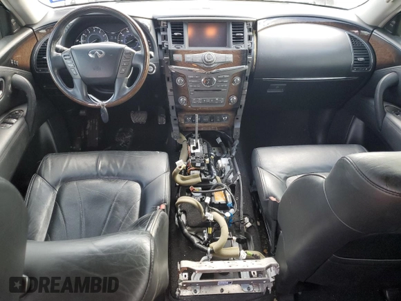 2014 Infiniti QX80 with VIN JN8AZ2NF8E9555594, listed as a Copart auction lot 40000354 with 140,479 mi miles and Salvage title. Bid and sale history available at DreamBid. Image 8.