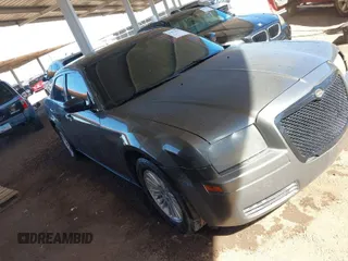 2009 Chrysler 300 LX with VIN 2C3KA43D79H574863, listed as a IAAI auction lot 41872418 with 1 mi miles. Bid and sale history available at carsss.com. Image 1.