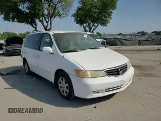2001 Honda Odyssey EX z VIN 2HKRL18661H500391, wystawiony jako Copart lot #57249725 z przebiegiem 207 905 mil mil oraz Szkoda całkowita • Salvage title. Historia ofert i sprzedaży dostępna na DreamBid. Obrazek 14.