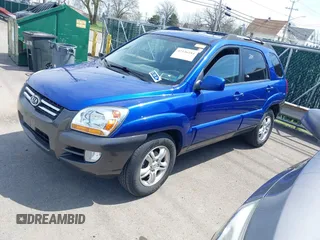 2006 Kia Sportage LX with VIN KNDJF723167214580, listed as a IAAI auction lot 42126184 with 125,434 mi miles and . Bid and sale history available at carsss.com. Image 2.