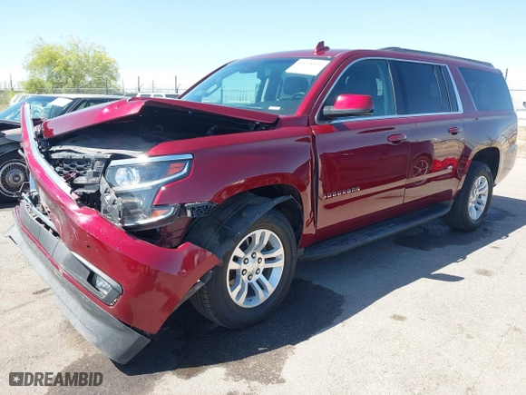 2019 Chevrolet Suburban LT with VIN 1GNSKHKC3KR298509, listed as a IAAI auction lot 42008133 with 101,253 mi miles. Bid and sale history available at carsss.com. Image 2.
