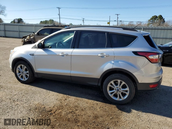 2018 Ford Escape SE with VIN 1FMCU0G90JUC13607, listed as a Copart auction lot 46534215 with 131,633 mi miles and Salvage Title. Bid and sale history available at carsss.com. Image 2.